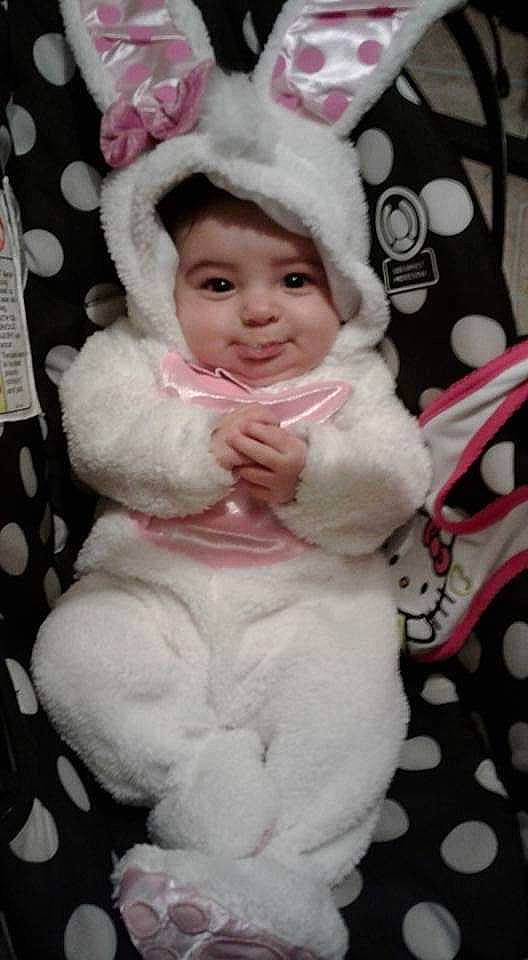 Josselyn is registered to the contest to win money with this photo: child, ear, fun, fur, girl, infant, joy, nose, person, pink, product, rabits_and_hares, skin, smile, textile, toddler