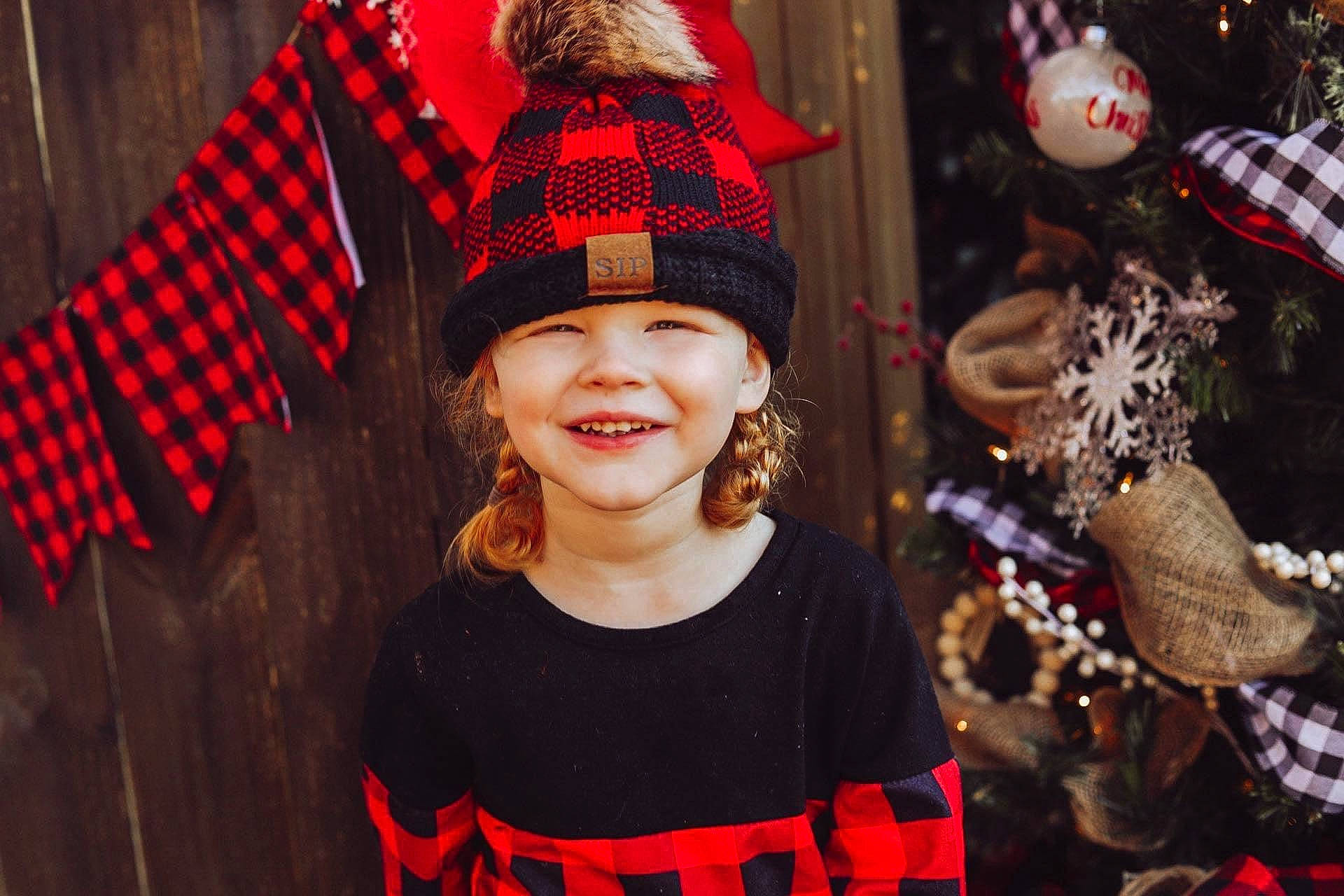 Kynsley is registered to the contest to win money with this photo: cap, christmas, christmas_decoration, christmas_eve, christmas_ornament, costume_hat, event, facial_expression, fashion, fun, happy, headgear, headwear, holiday, joy, pattern, people, person, red, smile