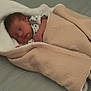 Myles joined the competition — help win amazing prizes! baby, newborn, sleeping, blanket, bed, cozy, infant, wrapped, peaceful, soft, cute, child, person, rest, comfort, indoors, toddler, warm, head, face