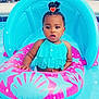 baby, chair, clothing, face, furniture, head, leisureactivities, person, photography, plant, pool, portrait, pottedplant, sport, summer, swimming, swimmingpool, swimwear, water, watersports