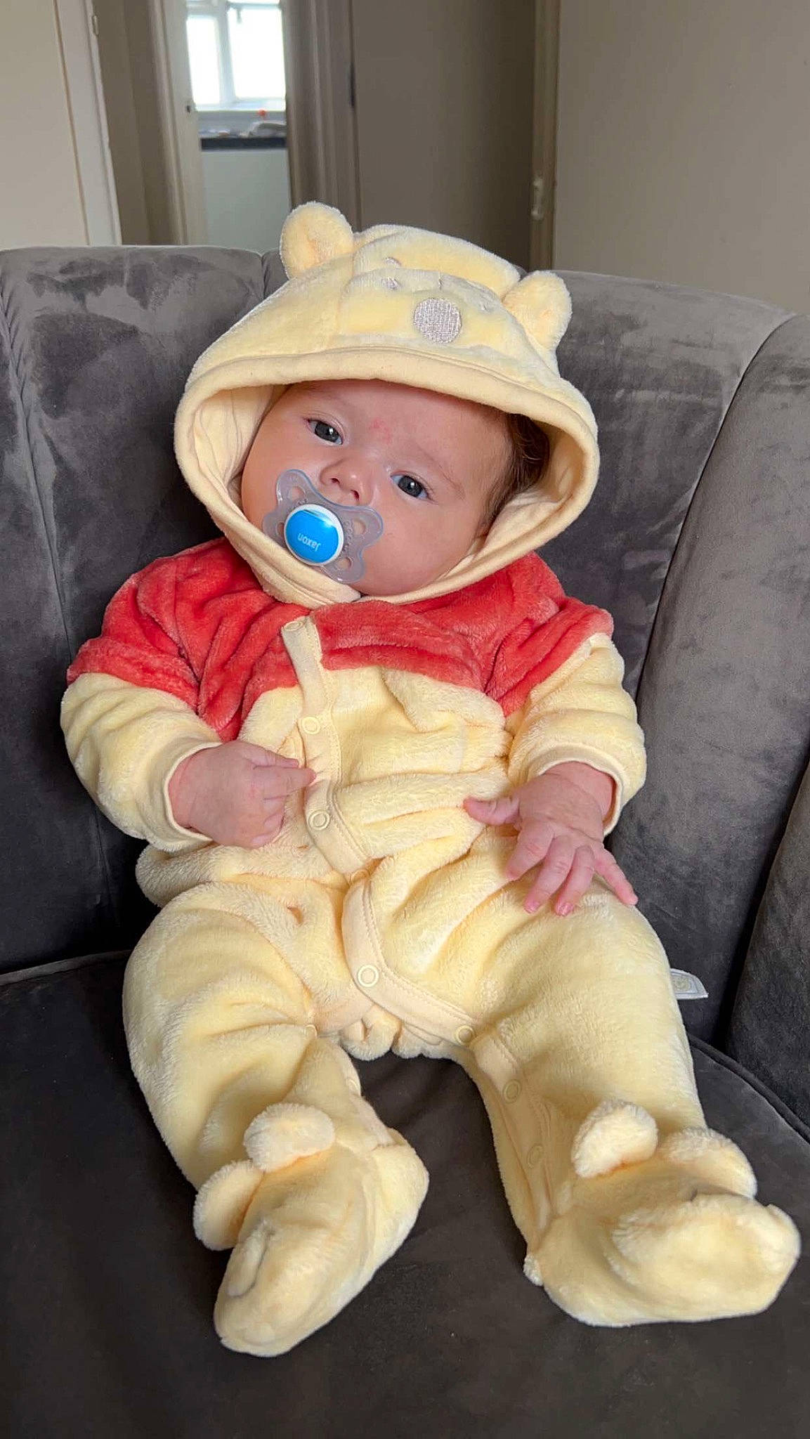 Jaxon is registered to the contest to win money with this photo: baby, baby_products, baby_toddler_clothing, cheek, child, comfort, eye, fun, happy, hat, head, headgear, headwear, nose, person, sitting, skin, sleeve, smile, sun_hat