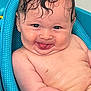baby, infant, bath, water, blue_bath_seat, wet_hair, tongue_out, smile, cheeky, skin, red_bracelet, cute, playful, child, person, indoors, closeup, expression, funny_face, happy