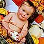 baby, child, pumpkin, autumn, fall, metal_tub, water, orange, yellow, white_pumpkin, striped_pumpkin, leaves, smiling, cute, seasonal, outdoor, harvest, festive, nature, portrait
