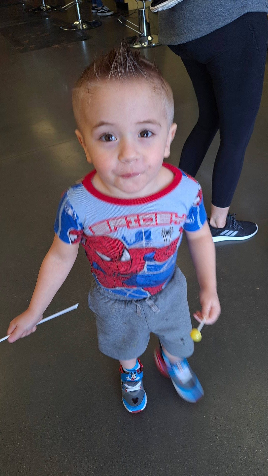 Oliver is registered to the contest to win money with this photo: baby, baby_toddler_clothing, cheek, child, electric_blue, flooring, footwear, fun, happy, human_leg, joint, knee, leg, person, shoe, sleeve, sneakers, standing, t_shirt, toddler