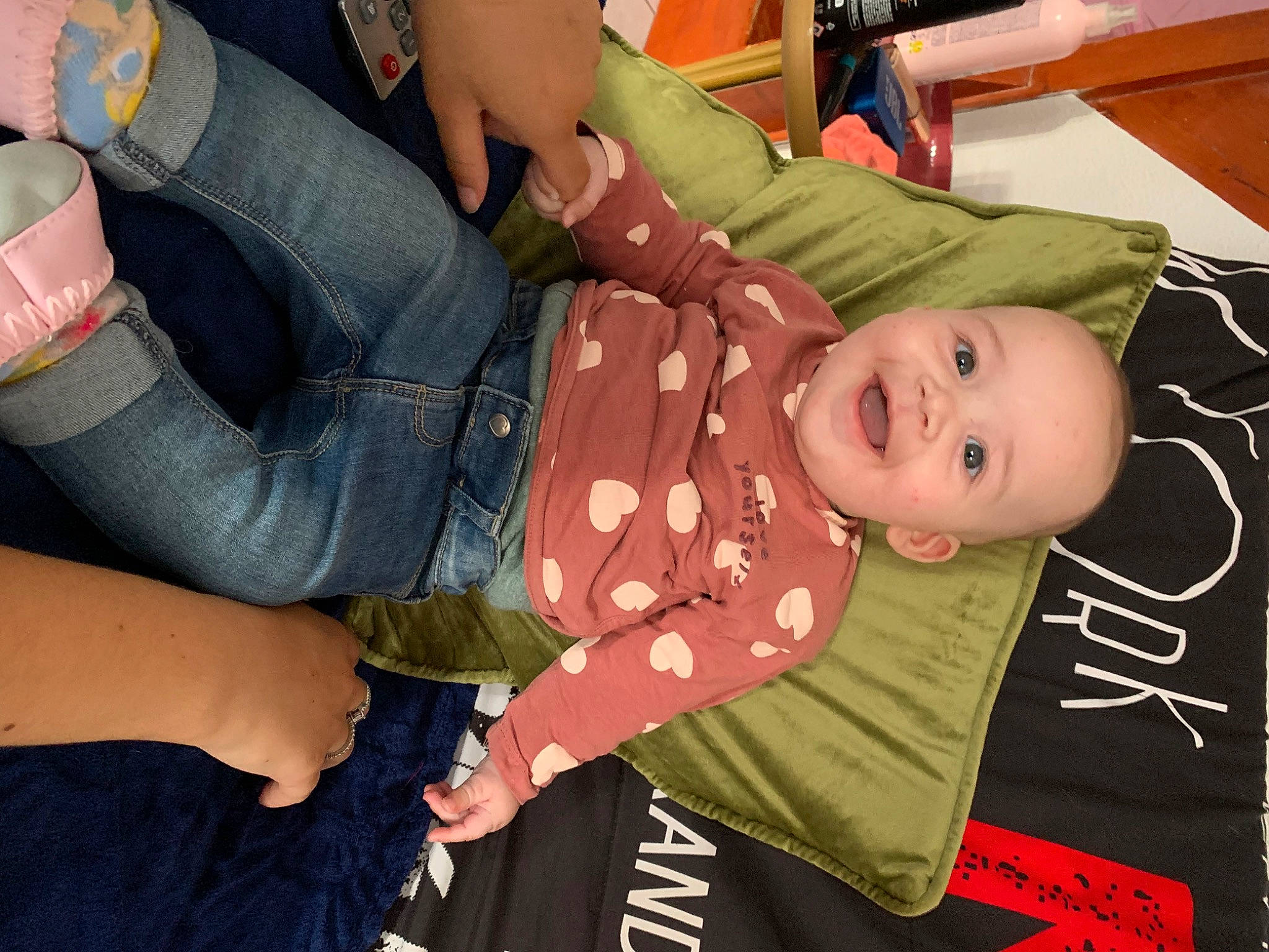 Melissa participe au concours pour gagner de l'argent avec cette photo : abdomen, baby, baby_products, baby_toddler_clothing, comfort, denim, elbow, fun, gesture, human_leg, knee, nail, pattern, person, smile, textile, thigh, toddler, trunk, waist