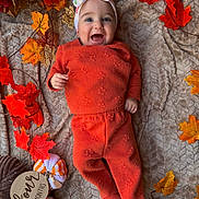 Aria is registered to the contest to win money with this photo: baby, infant, child, smiling, happy, portrait, autumn, fall, leaves, pumpkin, milestone, four_months, headband, orange_outfit, blanket, lying_down, indoor, seasonal, plush_toy, family_photo