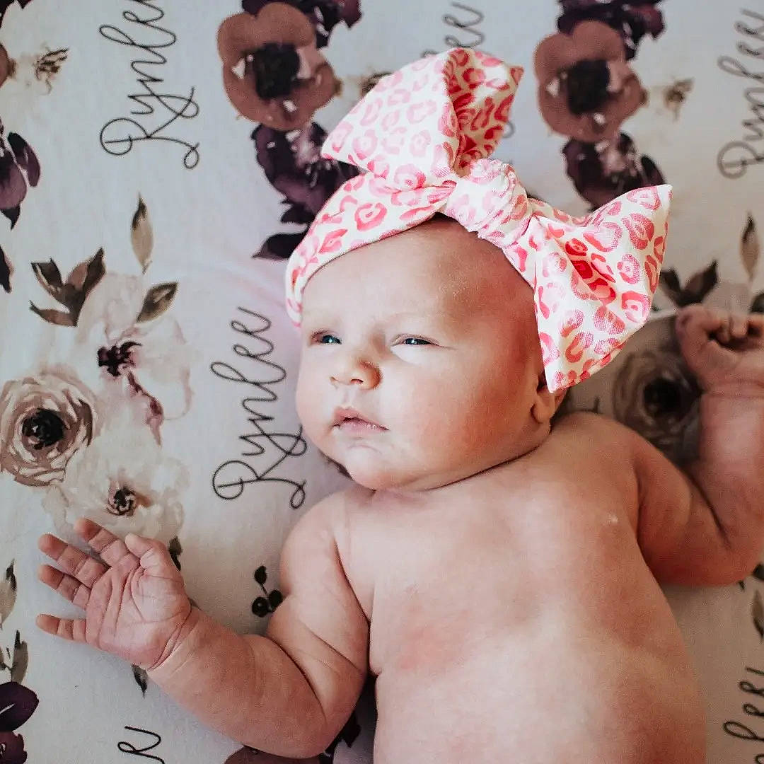 Rynlee is registered to the contest to win money with this photo: baby, baby_sleeping, baby_toddler_clothing, cap, child, eyelash, facial_expression, finger, font, gesture, happy, headgear, headpiece, headwear, pattern, person, pink, product, skin, textile