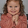 Alba a rejoint le concours — aidez-le/la à gagner de superbes lots ! blue_eyes, child, cozy, curly_hair, cute, expression, face, girl, hair_clips, hands_clasped, happy, indoor, joyful, person, pink_jacket, portrait, smile, studio_photo, warm_clothing, young_child