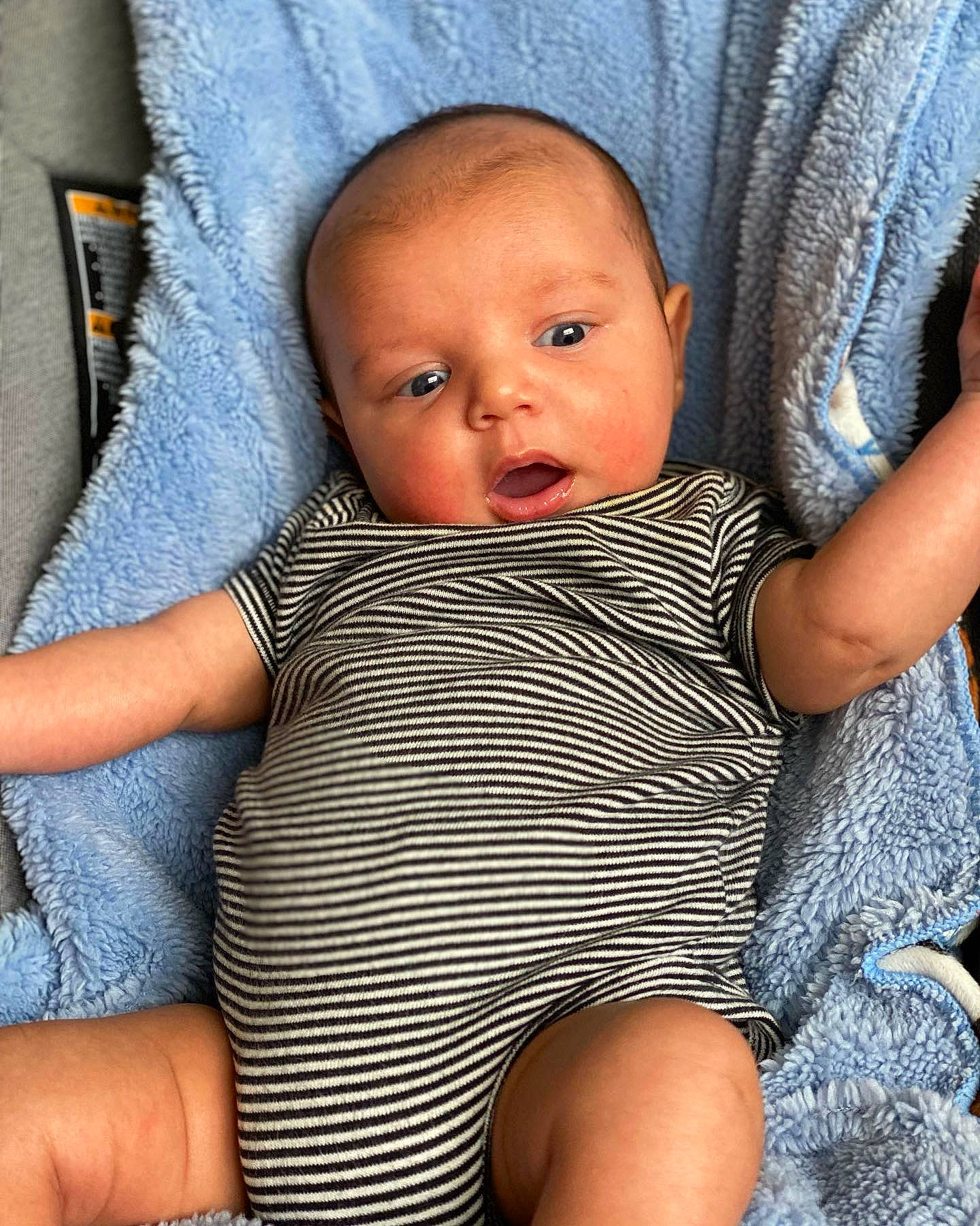 Marco is registered to the contest to win money with this photo: baby, baby_toddler_clothing, cheek, child, chin, comfort, eye, finger, hand, human_body, iris, leg, lip, mouth, neck, nose, person, skin, textile, thigh