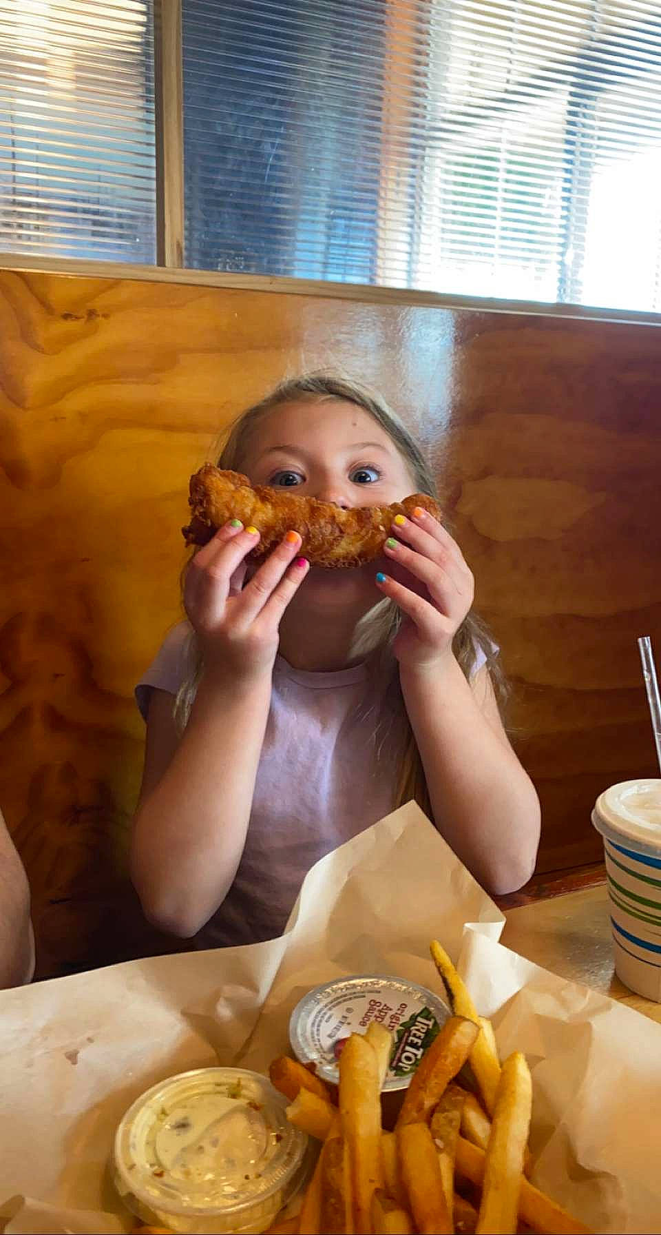 Zariyah joined the competition — help win amazing prizes! baked_goods, biting, bread, chair, comfort_food, cuisine, dish, fast_food, finger_food, food, food_craving, ingredient, junk_food, person, plate, staple_food, table, tableware, toddler, window