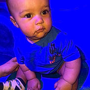 Wysdom joined the competition — help win amazing prizes! baby, child, infant, sitting, blue_light, curious, chubby_cheeks, short_hair, clothing, tshirt, socks, hand, footwear, indoor, blanket, portrait, cute, person, skin, face