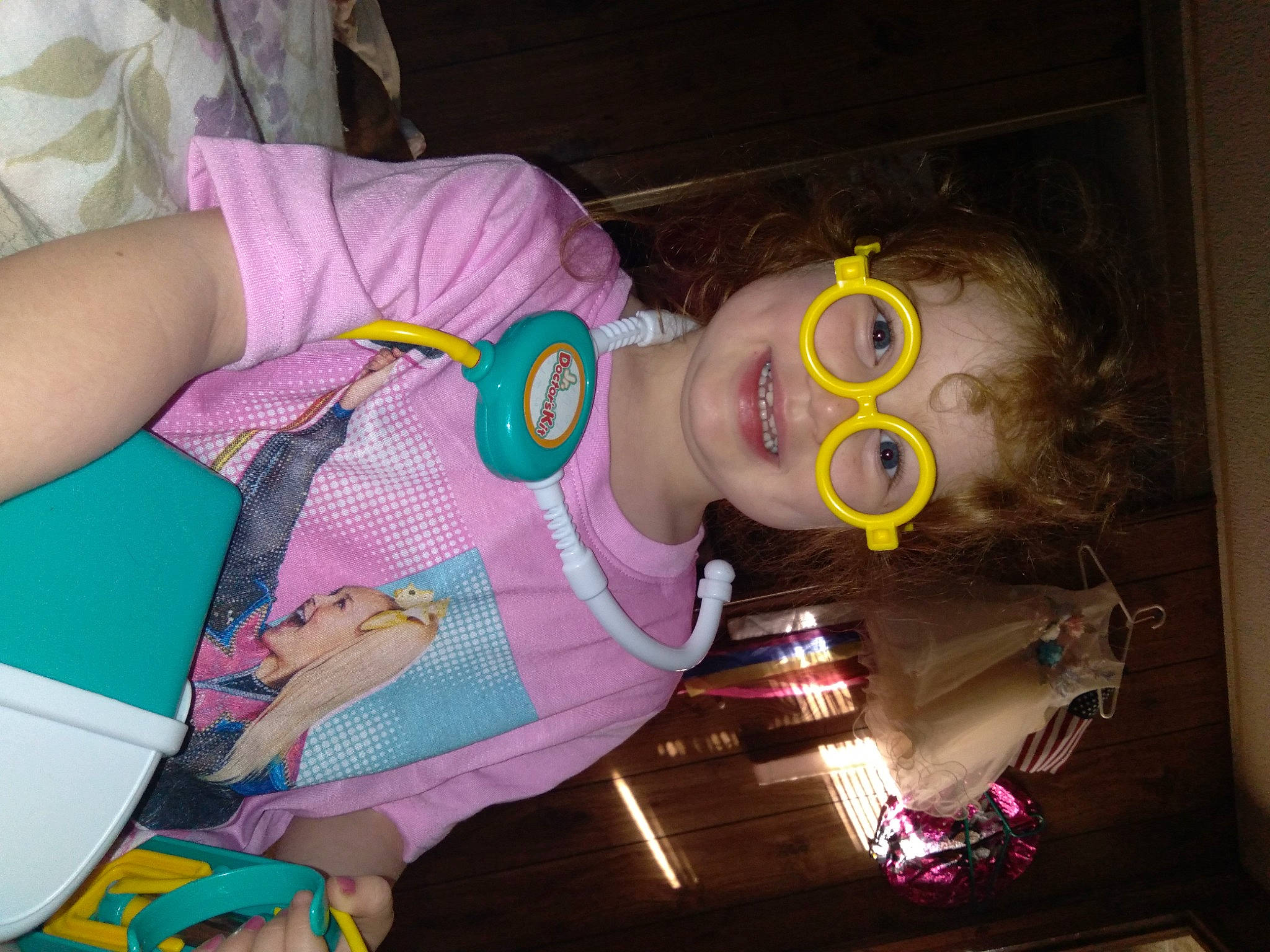 Monique is registered to the contest to win money with this photo: baby, baby_products, baby_toddler_clothing, cheek, child, event, eyewear, finger, fun, happy, joy, magenta, mouth, person, pink, play, product, purple, room, smile