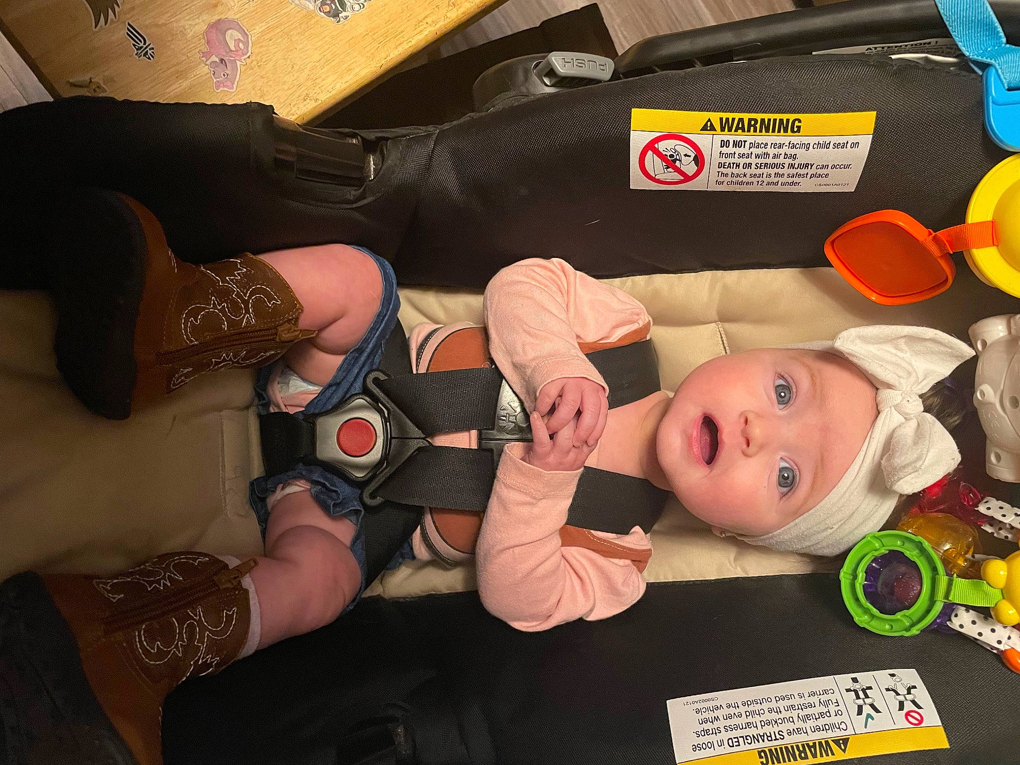 Emerson is registered to the contest to win money with this photo: abdomen, baby, baby_products, baby_toddler_clothing, chest, child, comfort, foot, fun, headwear, human_leg, knee, lap, person, room, sock, surprise, thigh, toddler