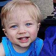 Thomas joined the competition — help win amazing prizes! child, toddler, blue_eyes, blonde_hair, smiling, face, portrait, sleeveless_shirt, blue_clothing, close_up, person, cute, happy, outdoor, fabric, texture, background, human, skin, young