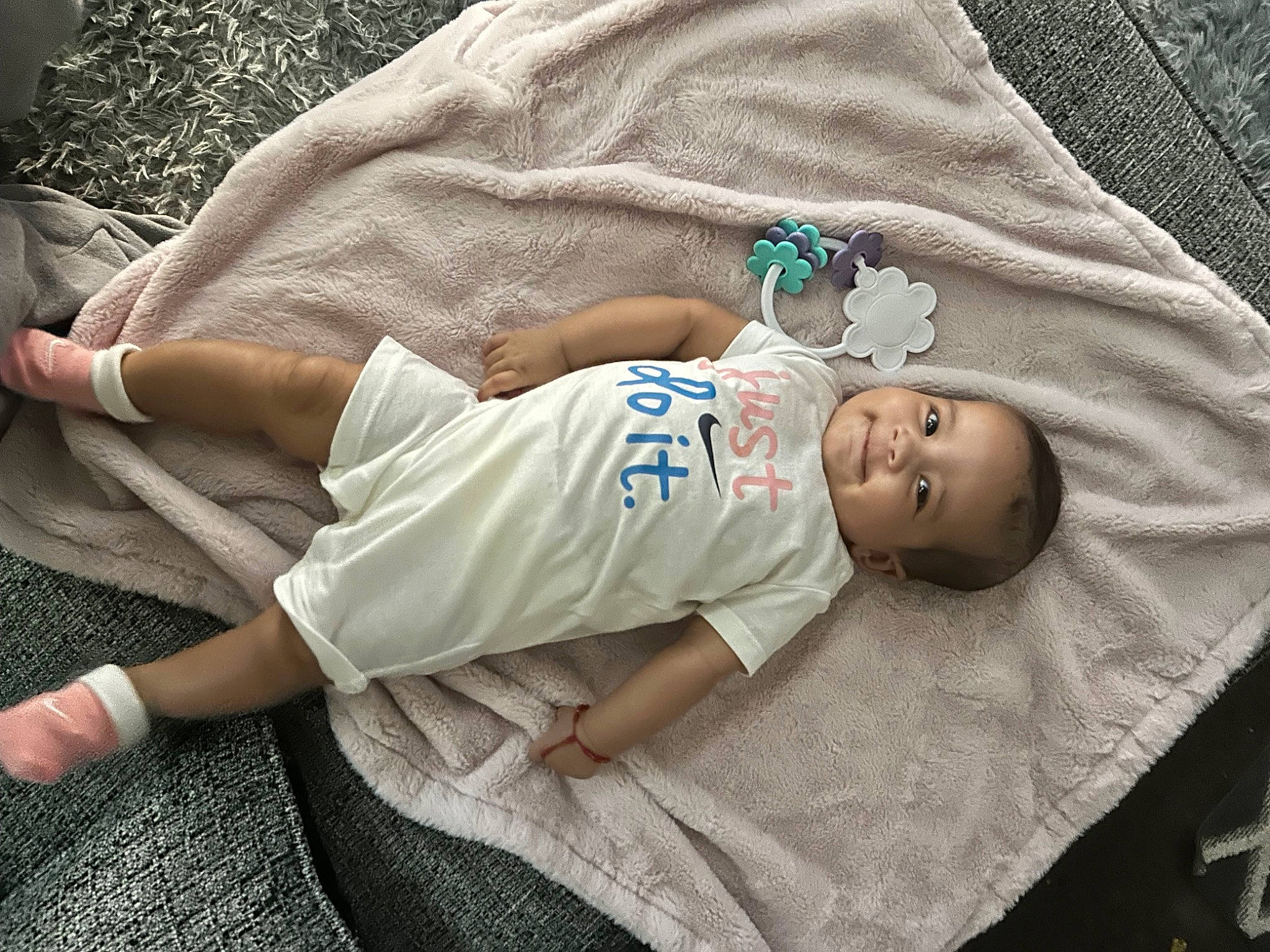 Jorja is registered to the contest to win money with this photo: baby, baby_toddler_clothing, child, comfort, couch, elbow, glasses, grass, hat, human_body, human_leg, linens, pattern, person, sitting, skin, sleeve, t_shirt, thigh, toddler