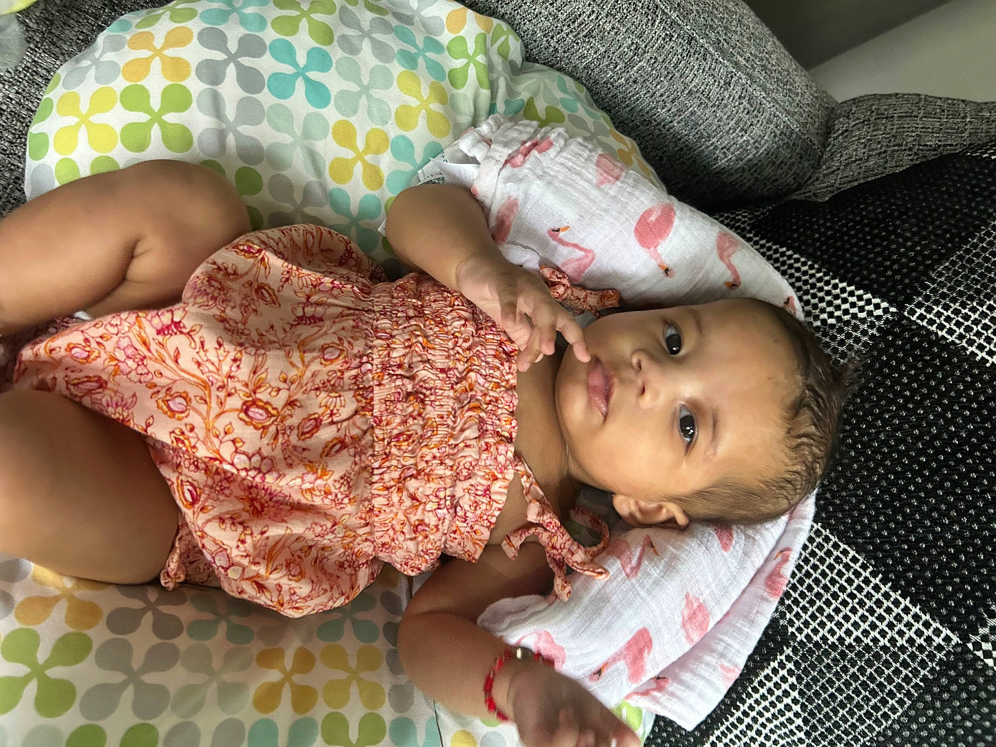 Jorja joined the competition — help win amazing prizes! baby, baby_products, baby_toddler_clothing, bedding, bedtime, cheek, child, comfort, day_dress, green, happy, human_leg, linens, pattern, person, room, skin, sleep, textile, toddler