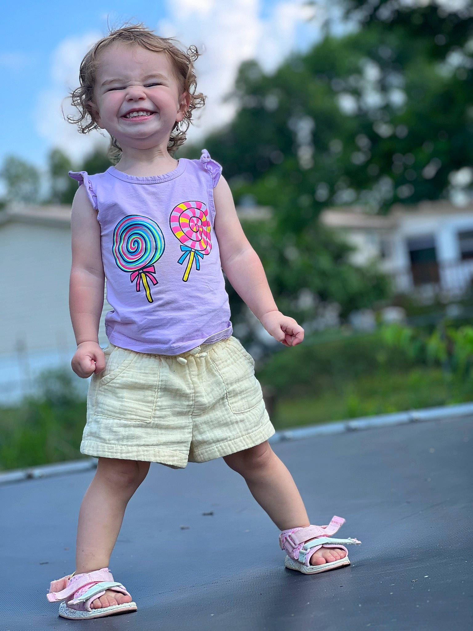 Tylee is registered to the contest to win money with this photo: asphalt, cloud, face, facial_expression, fun, grass, hair, happy, head, joy, leisure, person, pink, plant, shorts, sky, sleeve, smile, summer, t_shirt