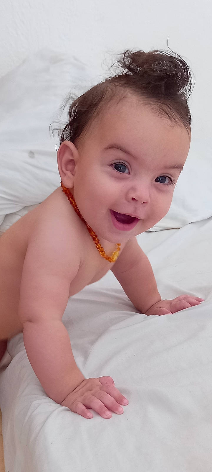 Harley participe au concours pour gagner de l'argent avec cette photo : baby, beauty, chest, comfort, dress, eye, eyelash, flash_photography, gesture, hair, hairstyle, happy, joint, lip, neck, person, pink, shoulder, skin, smile