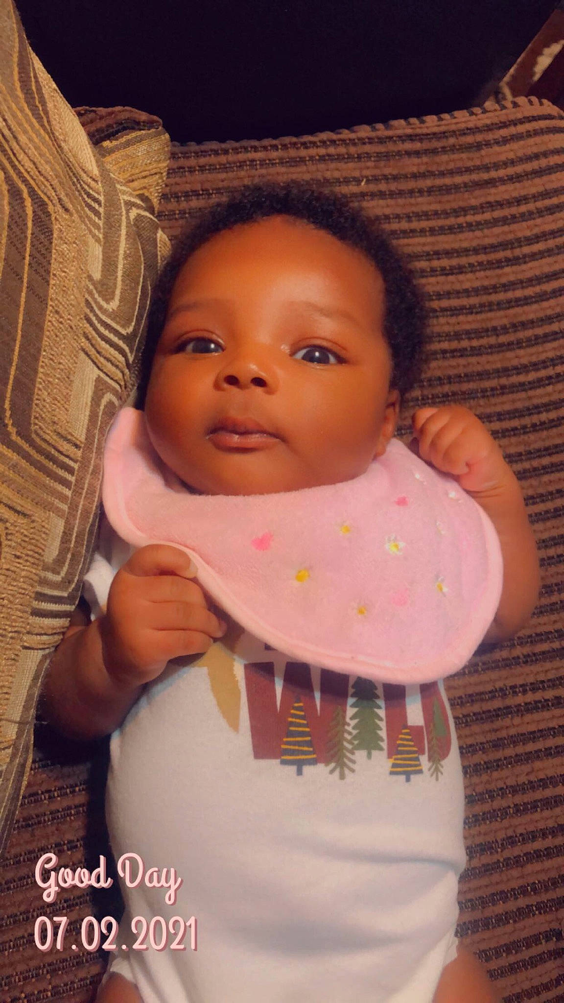 Olivia Micharl is registered to the contest to win money with this photo: baby, baby_toddler_clothing, beauty, bib, cheek, child, comfort, eyelash, finger, happy, linens, lip, nose, pattern, person, pink, skin, sleeve, smile, textile