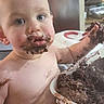 Hayes is registered to the contest to win money with this photo: baby, child, cake, chocolate, dessert, eating, messy, smiling, face, portrait, highchair, kitchen, food, birthday, frosting, hands, brownie, indoor, playful, celebration