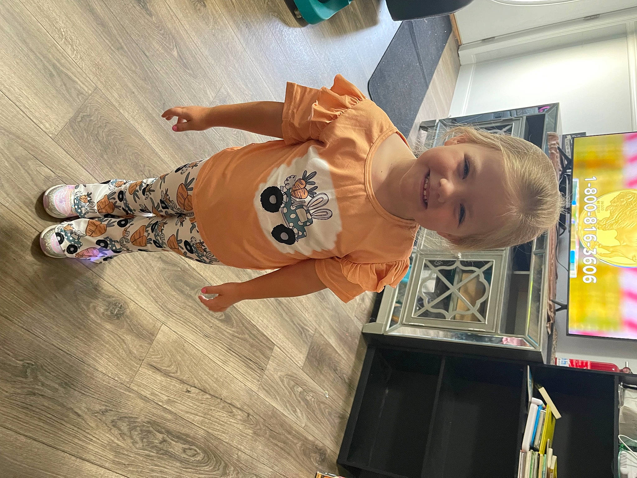Nova joined the competition — help win amazing prizes! abdomen, baby, baby_toddler_clothing, child, elbow, flooring, fun, hardwood, hat, human_leg, joy, knee, person, play, room, smile, t_shirt, thigh, toddler, trunk