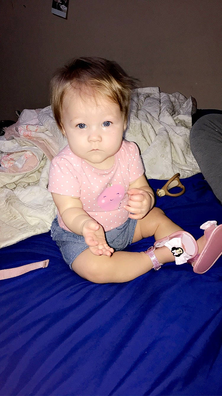 Iris joined the competition — help win amazing prizes! arm, baby, baby_toddler_clothing, cheek, child, comfort, finger, flash_photography, fun, hand, iris, lap, mammal, mouth, person, pink, purple, skin, smile, toddler