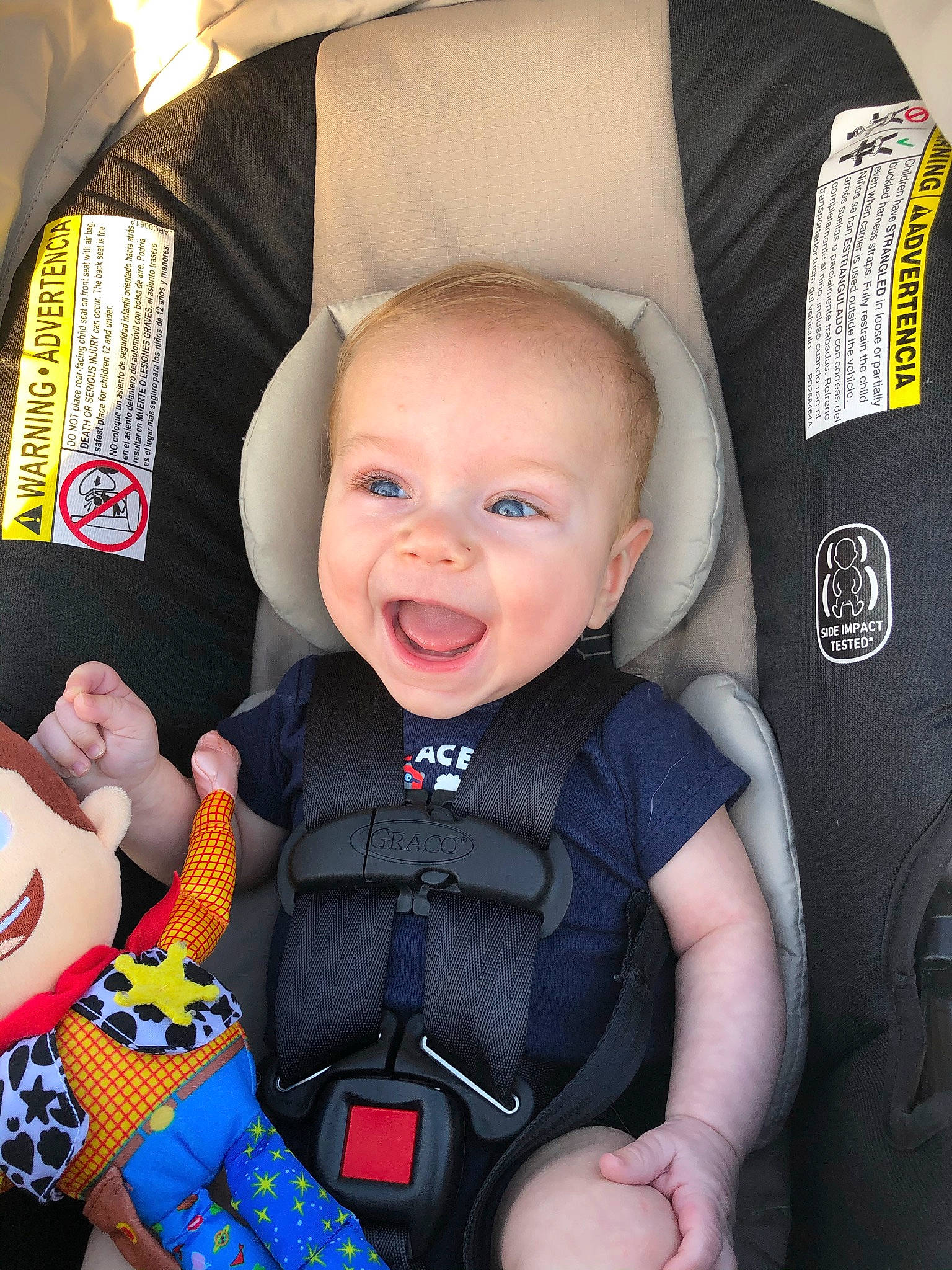Fynn is registered to the contest to win money with this photo: auto_part, baby, baby_carriage, baby_in_car_seat, baby_products, baby_toddler_clothing, car_seat, child, comfort, electric_blue, fun, happy, person, personal_protective_equipment, product, seat_belt, service, sitting, smile, steering_wheel