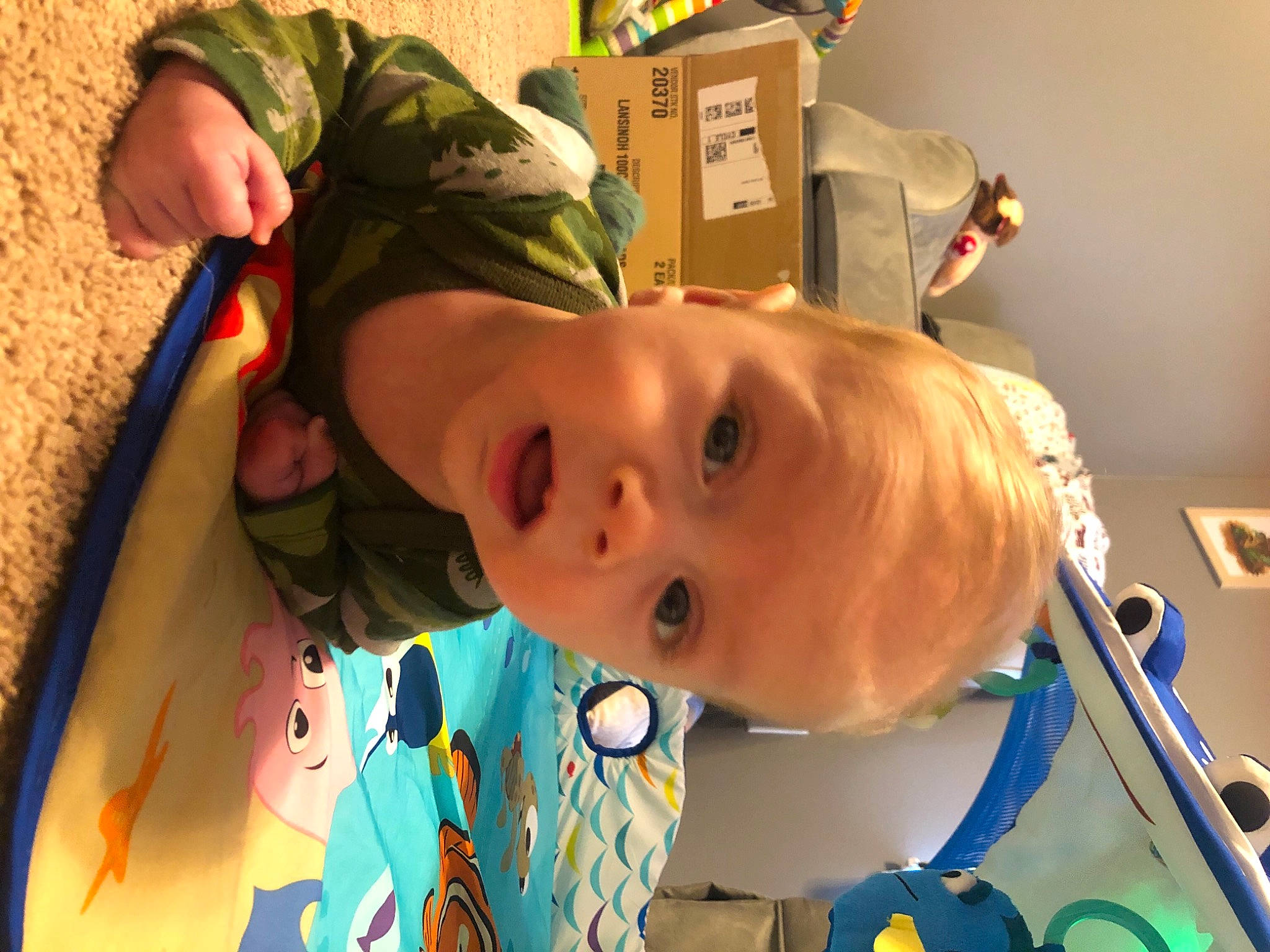 Fynn joined the competition — help win amazing prizes! baby, baby_products, baby_toys, cheek, child, fun, green, happy, leisure, mouth, nose, person, play, product, recreation, room, smile, surprise, textile, toddler