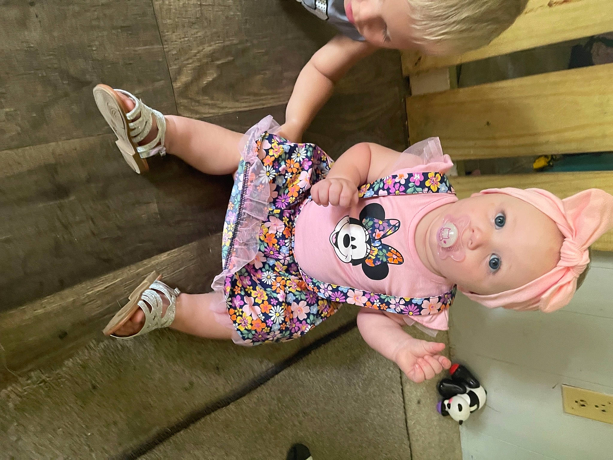 Jaelyn joined the competition — help win amazing prizes! baby, baby_toddler_clothing, child, flooring, foot, fun, grass, happy, hat, human_leg, joint, knee, leg, leisure, person, pink, sandal, sitting, street_fashion, surprise