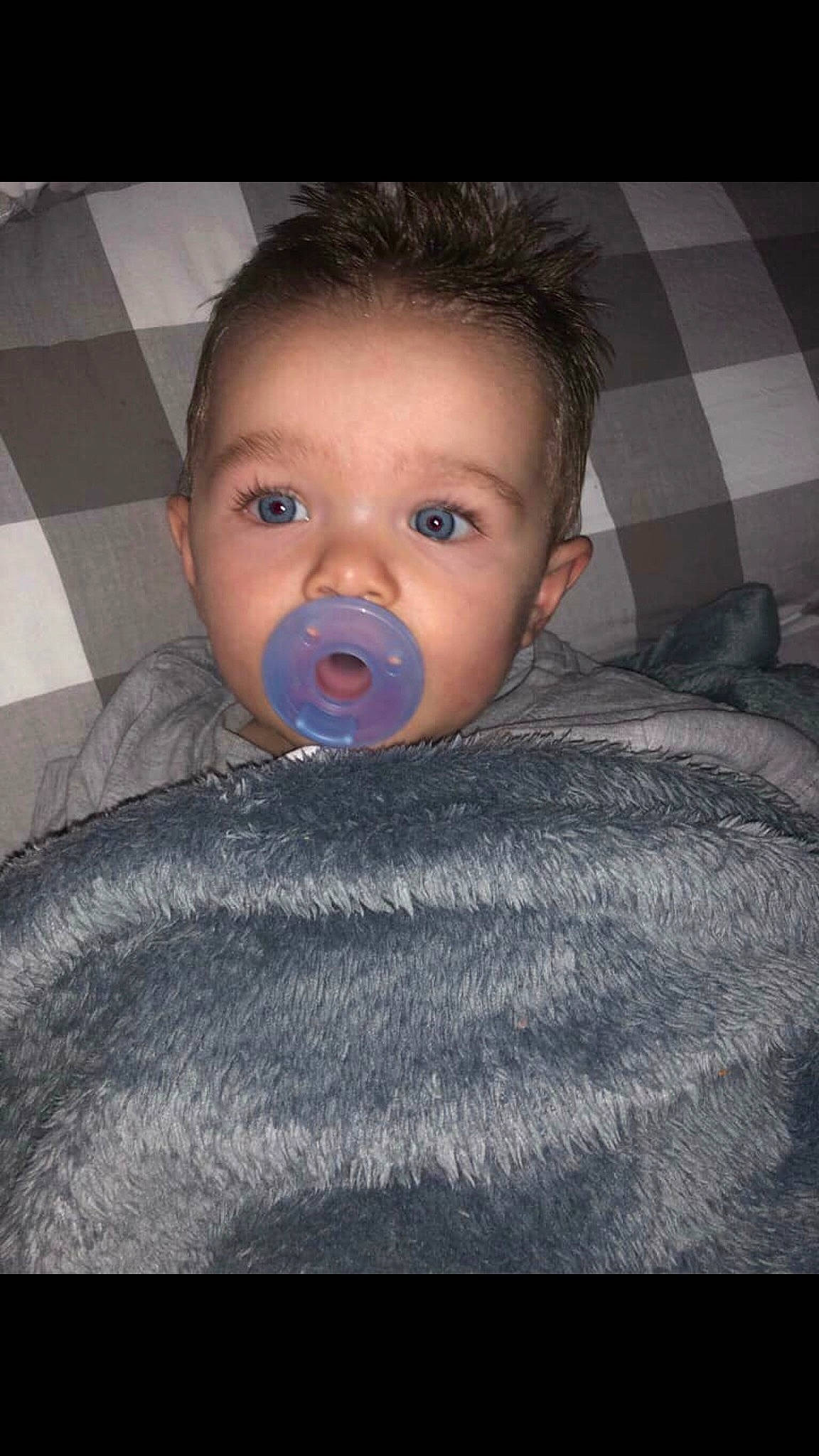 Kenny is registered to the contest to win money with this photo: baby, black_hair, cheek, child, chin, eye, eyebrow, face, forehead, hair, head, lip, mouth, nose, person, selfie, skin, smile, toddler