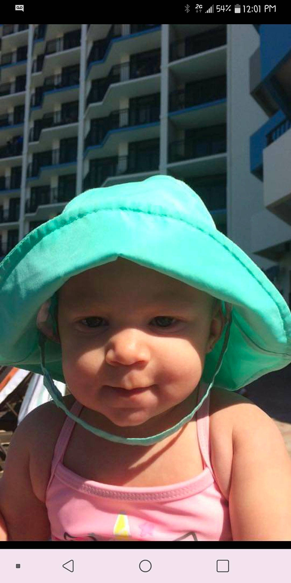 Emelia joined the competition — help win amazing prizes! baby, bonnet, child, cool, fashion_accessory, green, hat, head, headgear, headwear, person, personal_protective_equipment, skin, smile, sun_hat, toddler, vacation