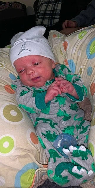 Wyatt is registered to the contest to win money with this photo: baby, bedtime, birth, child, headwear, person, sleep, toddler