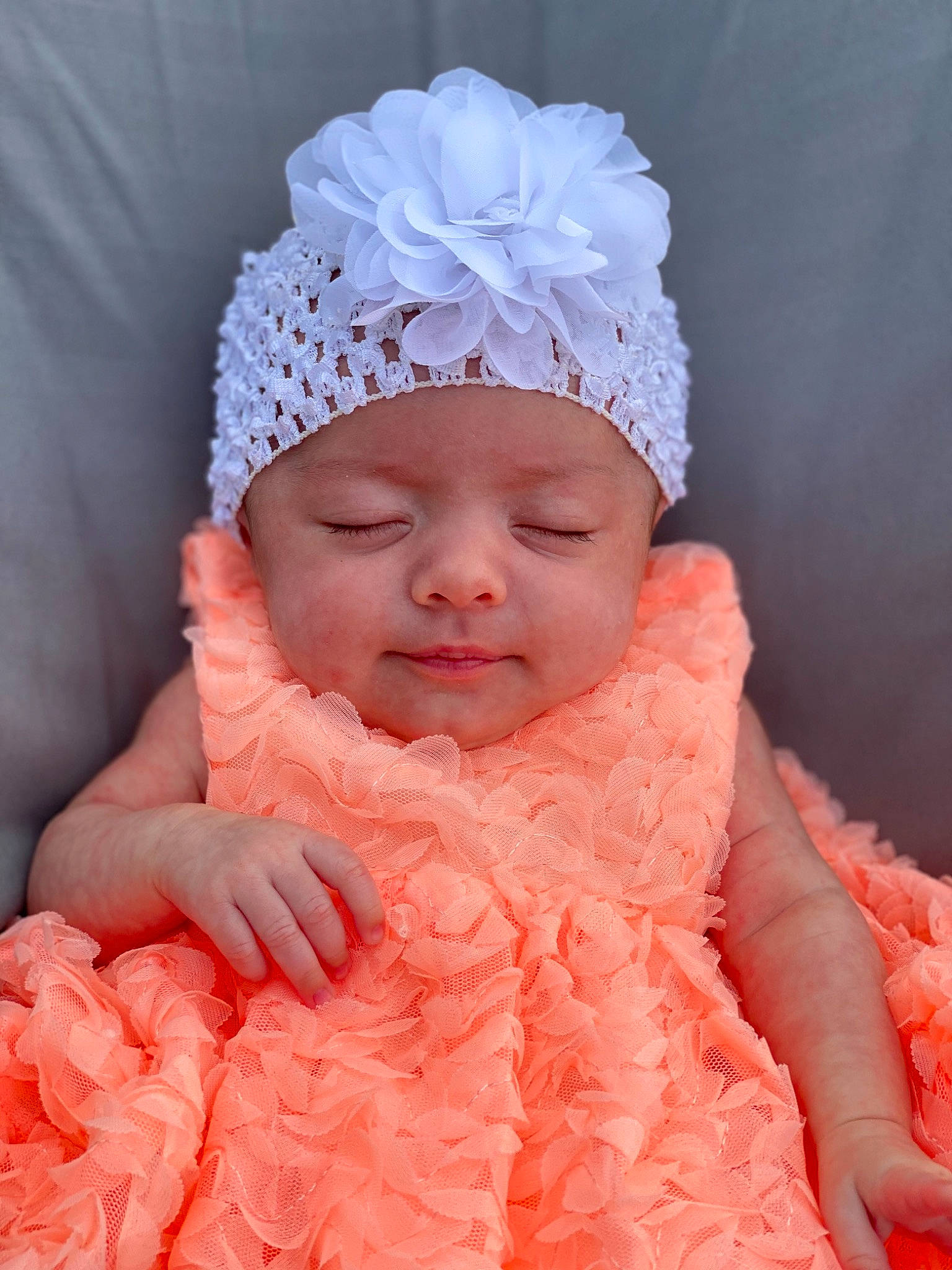 Carleigh is registered to the contest to win money with this photo: baby, bonnet, child, clothing, costume_accessory, fashion_accessory, hair_accessory, head, headgear, headpiece, headwear, knit_cap, person, pink, toddler