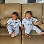 toddler, child, couch, living_room, matching_outfits, footwear_free, indoor, furniture, portrait, seated, curious, home, window_blinds, painting, skin, person, two_children, barefoot, relaxed, casual