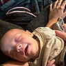Raelynn is registered to the contest to win money with this photo: baby, sleeping, smiling, infant, person, hand, blanket, clothing, arm, cozy, comfort, rest, closeup, indoor, cute, peaceful, newborn, portrait, skin, relaxation