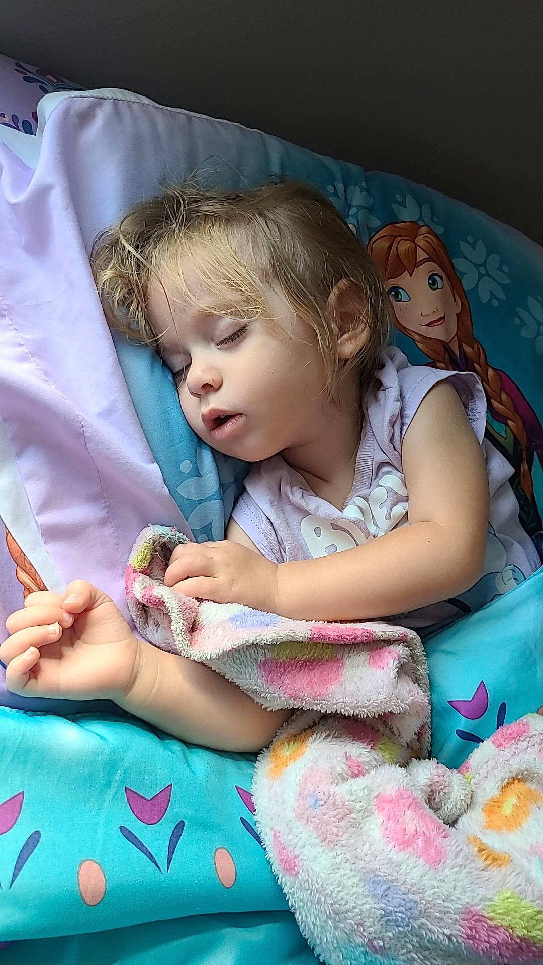 Eleanor is registered to the contest to win money with this photo: arm, baby, baby_toddler_clothing, beauty, cheek, child, comfort, facial_expression, fun, hairstyle, happy, linens, mammal, people, person, pink, product, skin, textile, toddler