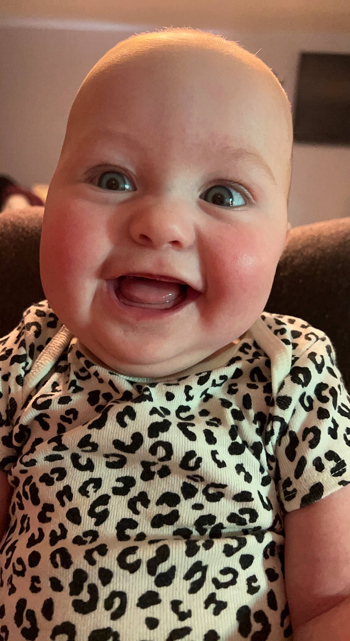 Hazel is registered to the contest to win money with this photo: baby_toddler_clothing, cheek, collar, dress, facial_expression, happy, human, human_body, iris, lip, mammal, neck, nose, organ, outerwear, person, skin, sleeve, smile, tooth