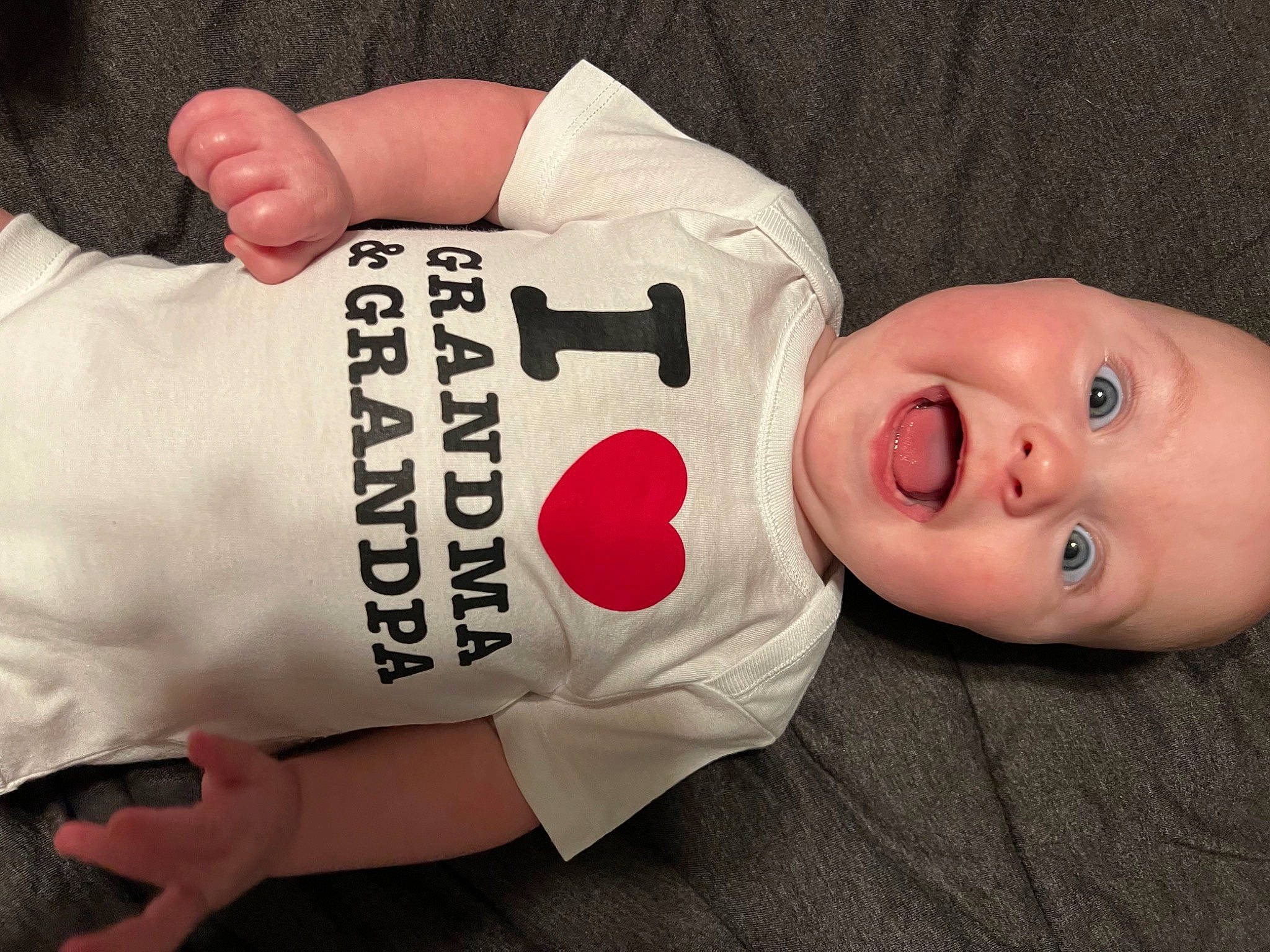 Hazel is registered to the contest to win money with this photo: baby, baby_products, baby_toddler_clothing, bracelet, carmine, cheek, chest, child, elbow, finger, font, gesture, glove, hand, nail, person, sleeve, thumb, toddler, wrist