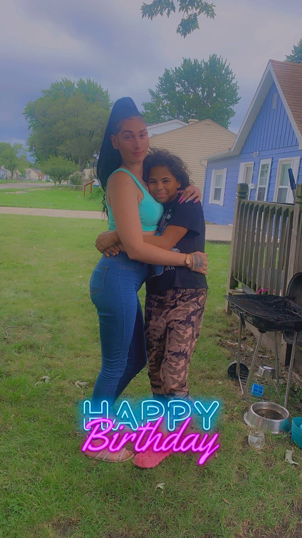 Armani is registered to the contest to win money with this photo: child, electric_blue, fun, grass, grassland, happy, house, joy, landscape, lawn, leisure, people_in_nature, person, plant, recreation, sitting, sky, summer, t_shirt, toddler