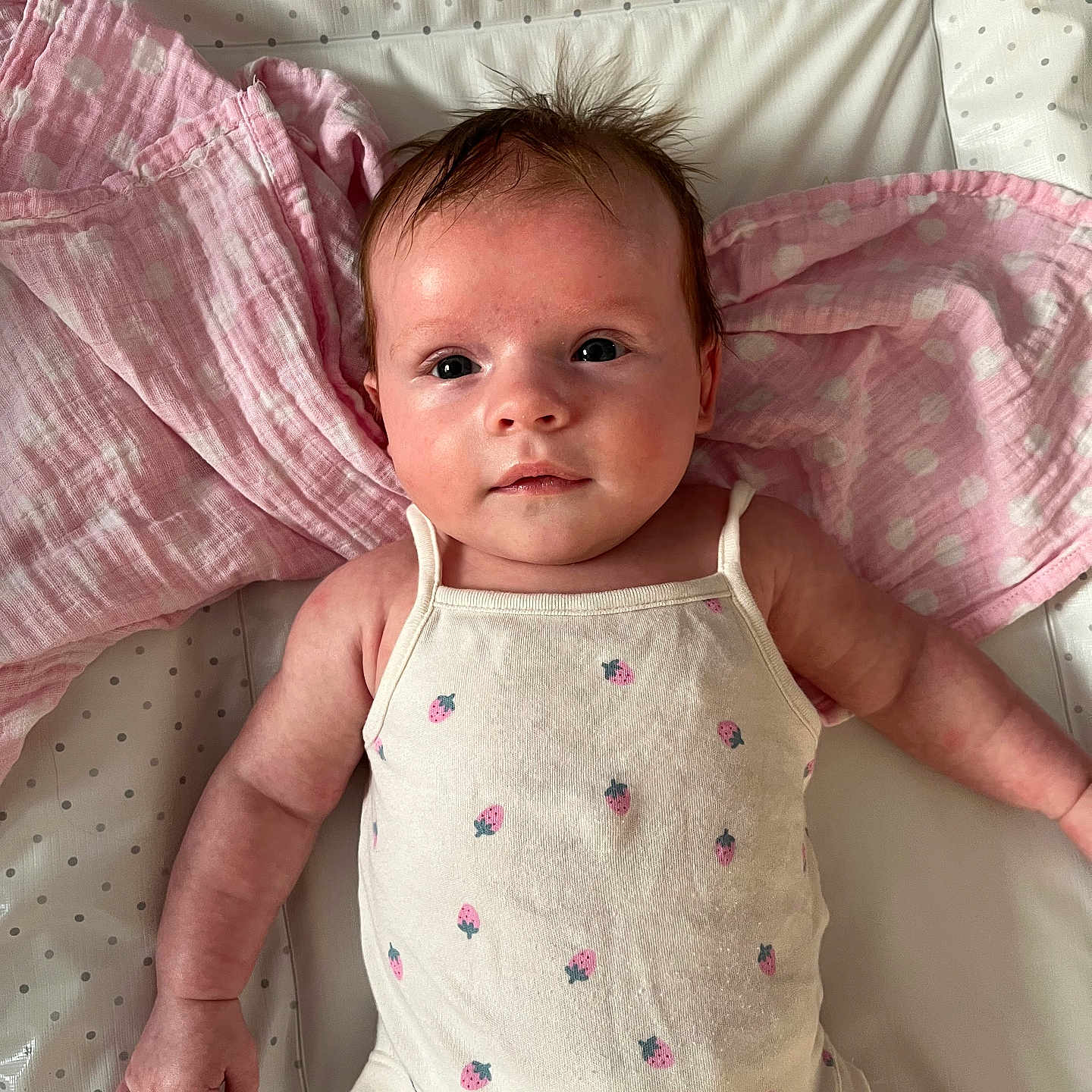 Ella is registered to the contest to win money with this photo: baby, bed, bedroom, blanket, bodypart, couch, crib, cushion, face, finger, furniture, hand, head, homedecor, indoors, newborn, person, photography, portrait, room