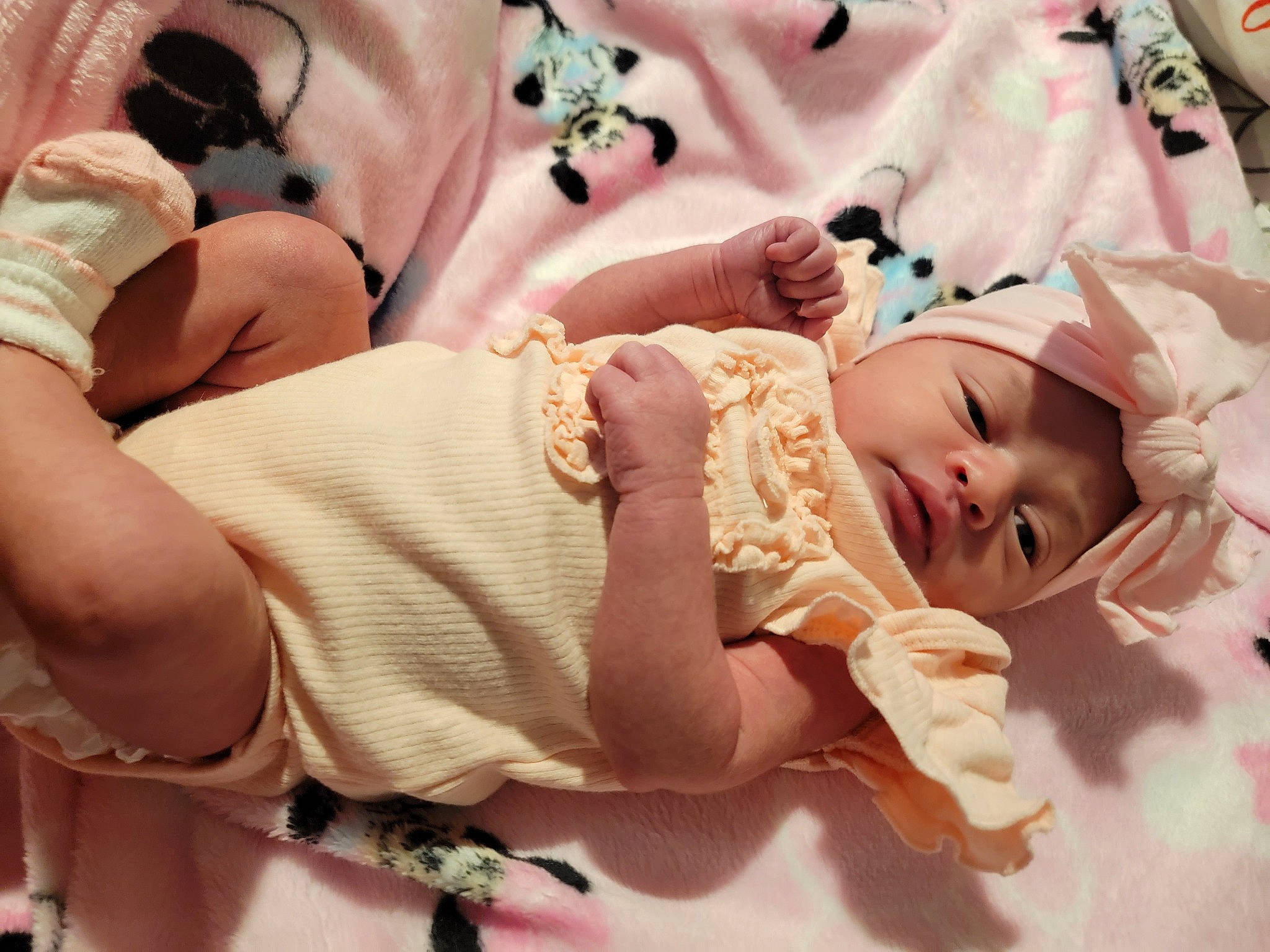 Za'Kaylah is registered to the contest to win money with this photo: baby, baby_toddler_clothing, cheek, child, comfort, eyelash, finger, hand, headwear, human_body, leg, nail, pattern, person, pink, skin, sleeve, thigh, thumb, toddler