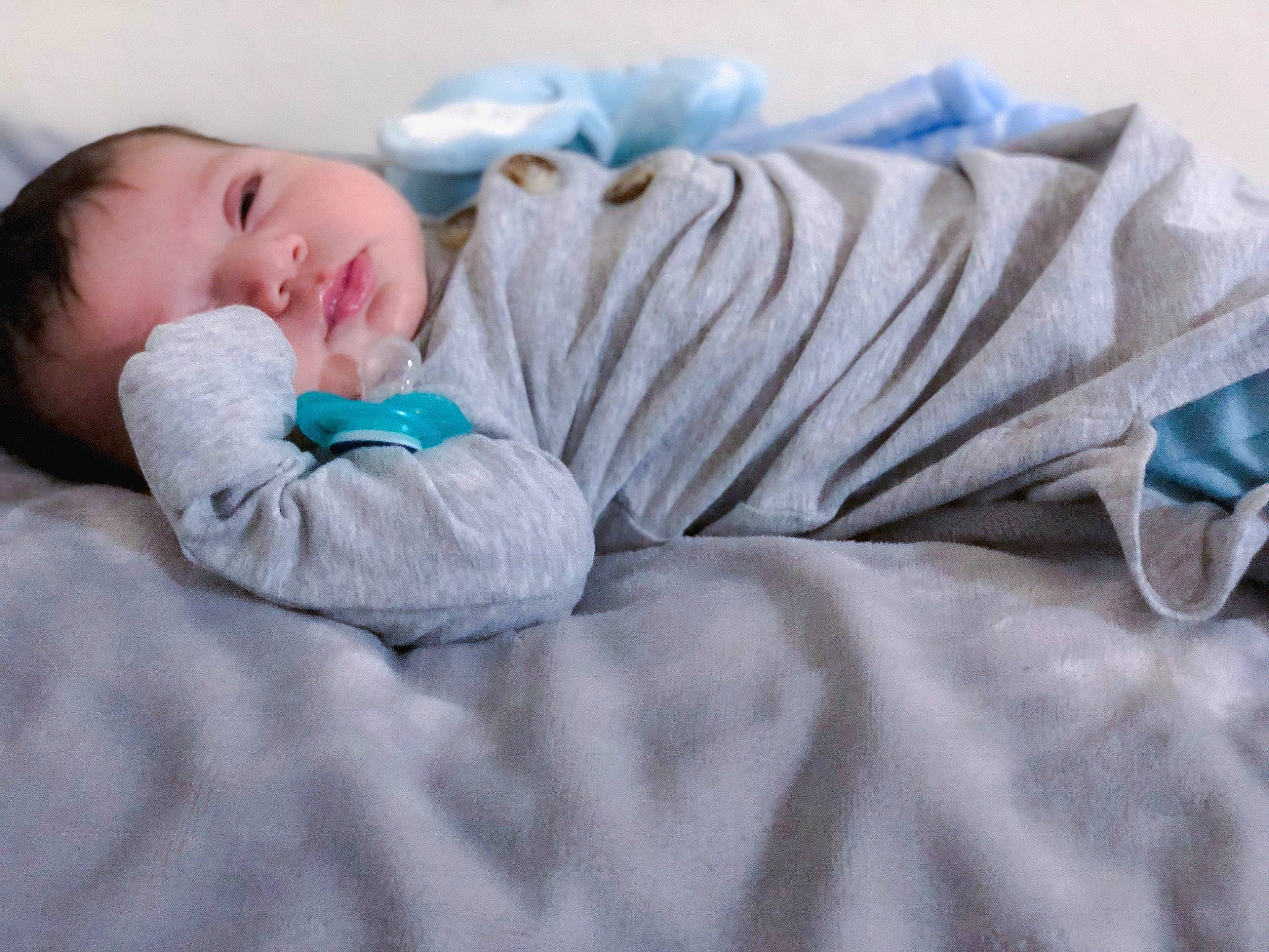 Octavio joined the competition — help win amazing prizes! baby, baby_products, baby_sleeping, baby_toddler_clothing, bedding, bedtime, child, comfort, electric_blue, eye, face, fur, grey, head, linens, nap, person, room, skin, sleeve