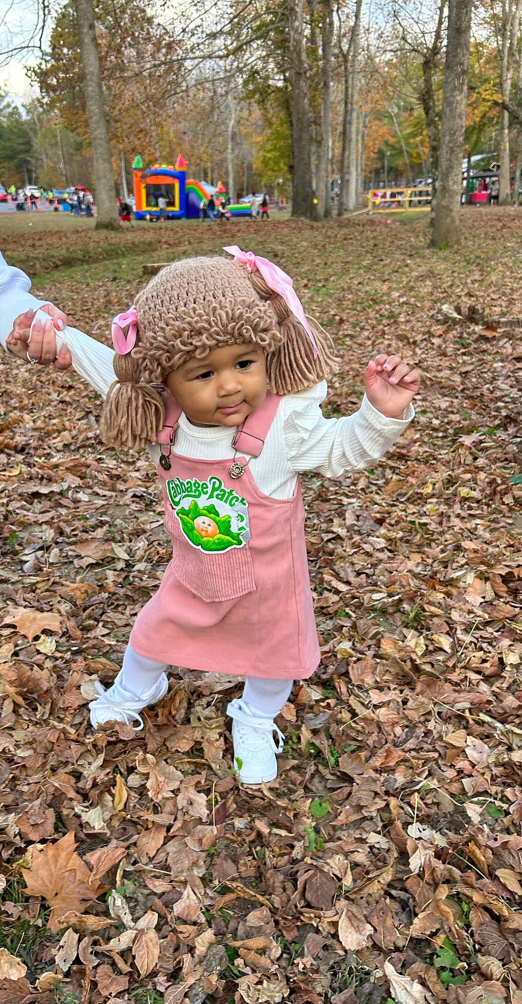 Alaina joined the competition — help win amazing prizes! baby_toddler_clothing, cap, child, forest, fun, garden, grass, happy, hat, headwear, landscape, leaf, leisure, magenta, people_in_nature, person, plant, play, recreation, soil