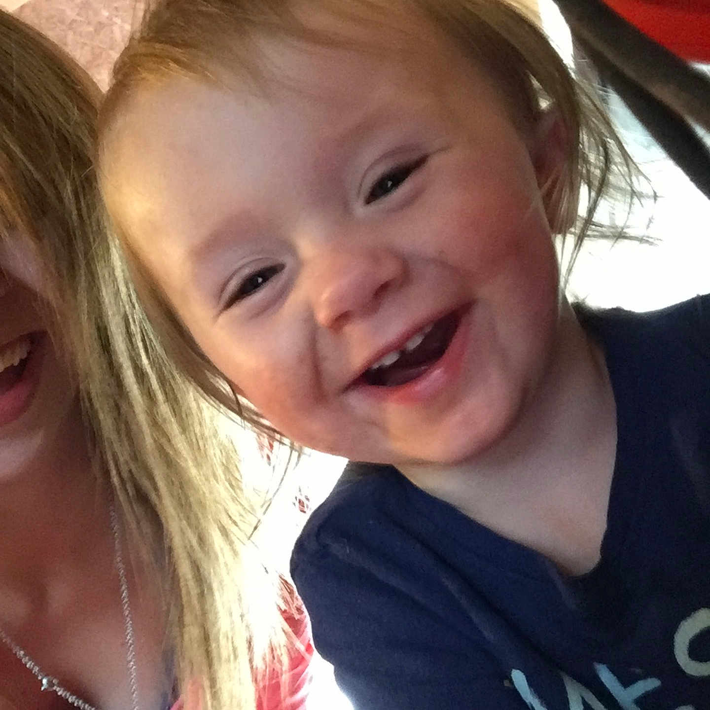 Aurora is registered to the contest to win money with this photo: blond, child, face, facial_expression, finger, girl, hair, hand, head, infant, mouth, nose, organ, person, skin