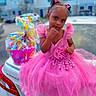 Viviana joined the competition — help win amazing prizes! child, girl, pink_dress, bows, gift_basket, car, outdoor, portrait, tulle, dress, cute, fashion, celebration, holiday, thinking, young, person, accessory, hair_style, sitting