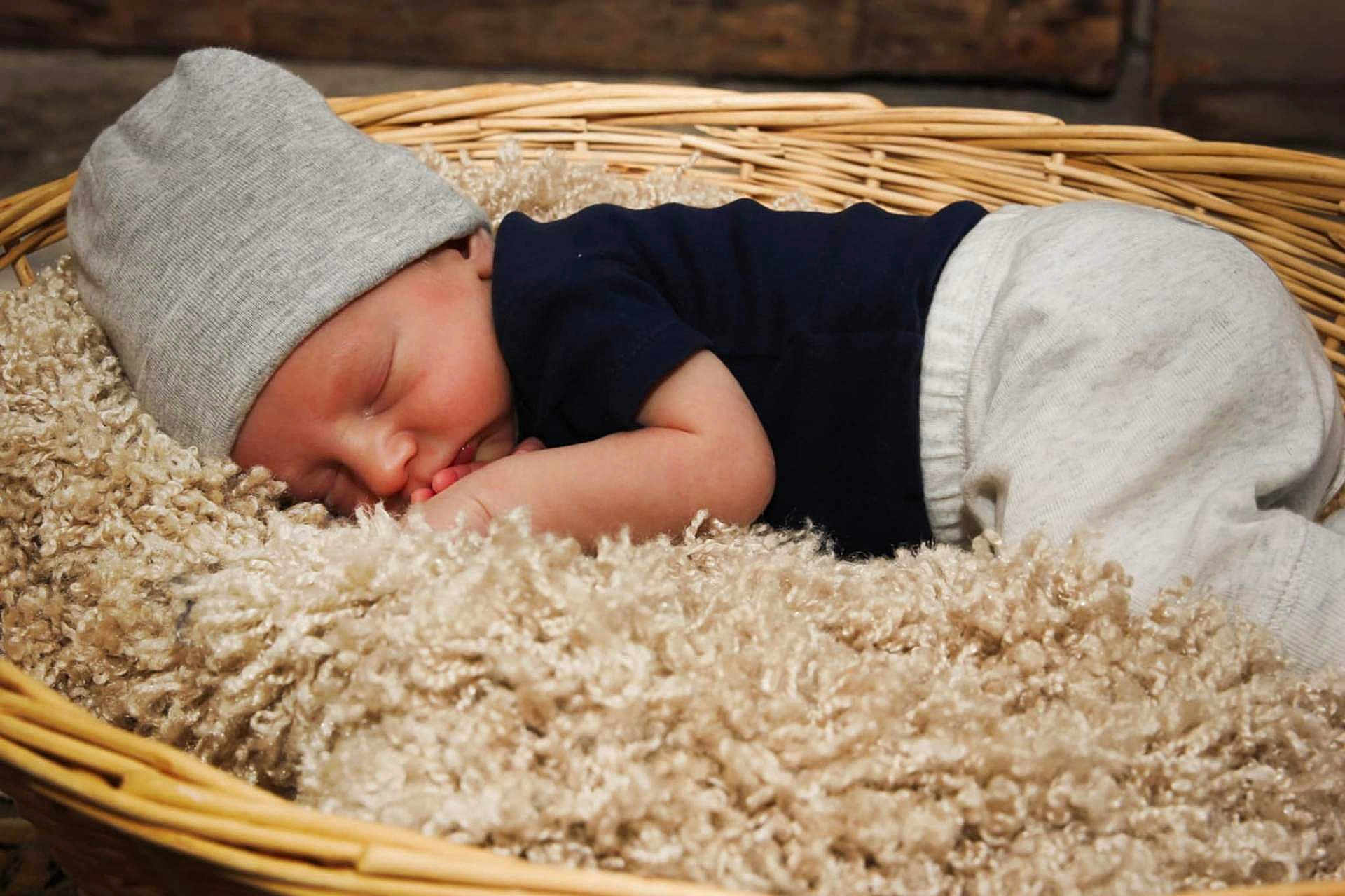 Ryker joined the competition — help win amazing prizes! baby, sleeping, hat, blanket, basket, cozy, infant, soft, cute, clothing, peaceful, rest, newborn, child, portrait, indoor, warm, relaxation, nursery, comfort