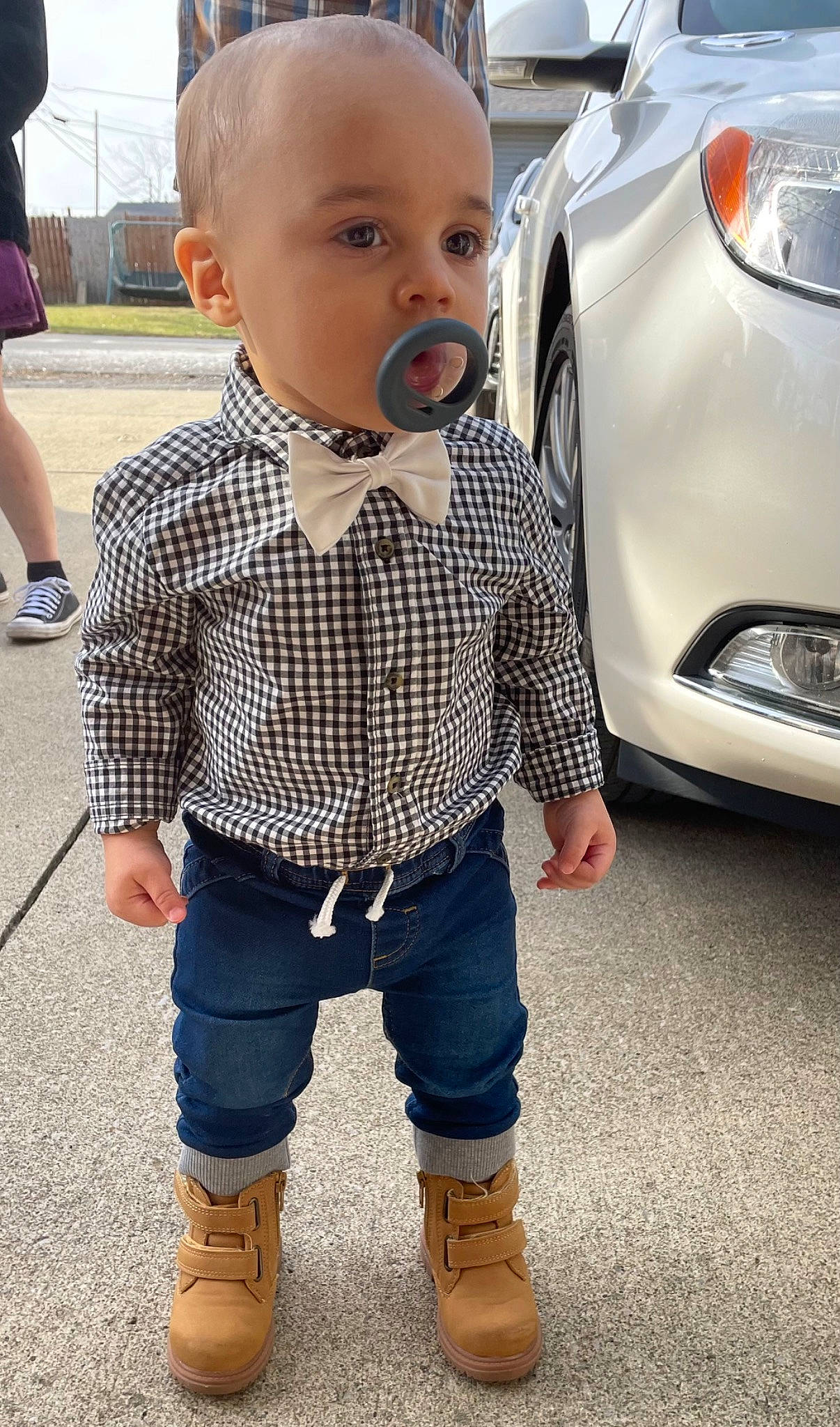 Mateo joined the competition — help win amazing prizes! alloy_wheel, automotive_design, automotive_lighting, automotive_tire, black, car, cool, eyewear, fender, footwear, hairstyle, head, motor_vehicle, person, plaid, shoe, sneakers, tartan, vehicle, vehicle_door