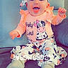 Emberley Hughes joined the competition — help win amazing prizes! baby, child, infant, smiling, laughing, portrait, seated, indoors, chair, cow_print, outfit, bow, headband, long_sleeves, socks, hands, face, happy, colorful, photography