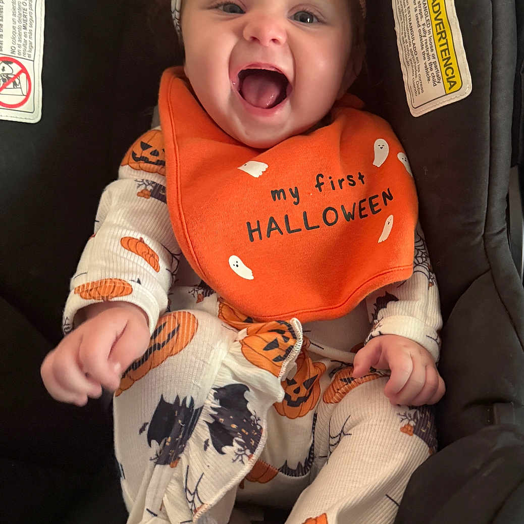 Kynslee joined the competition — help win amazing prizes! baby, bat, bib, black, car_seat, child, clothing, costume, cute, halloween, happy, headband, holiday, infant, orange, portrait, pumpkin, seatbelt, smiling, white