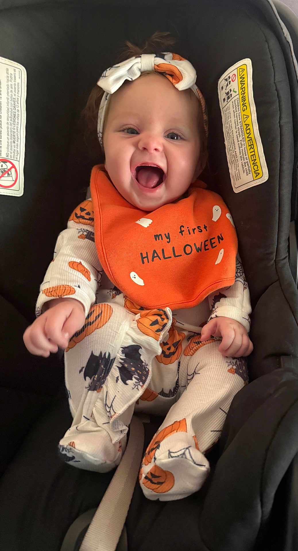 Kynslee joined the competition — help win amazing prizes! baby, child, smiling, halloween, bib, pumpkin, bat, headband, car_seat, clothing, infant, cute, happy, portrait, holiday, costume, orange, white, black, seatbelt